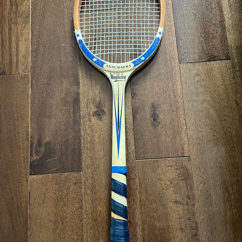 Vintage Tennis Racket with Blue and Brown Accents
